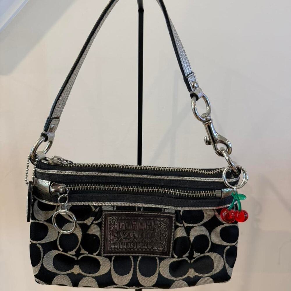 Coach Poppy Signature Wristlet